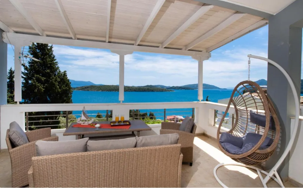 Bedroom opening directly to the sea-view terrace
